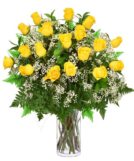 Long stem Yellow Roses and Baby's Breath in a clear glass vase.