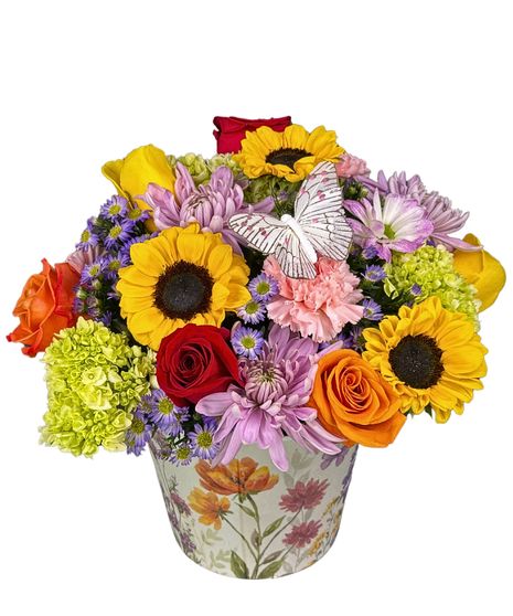 colorful vase arrangement featuring butterflies and sunflowers