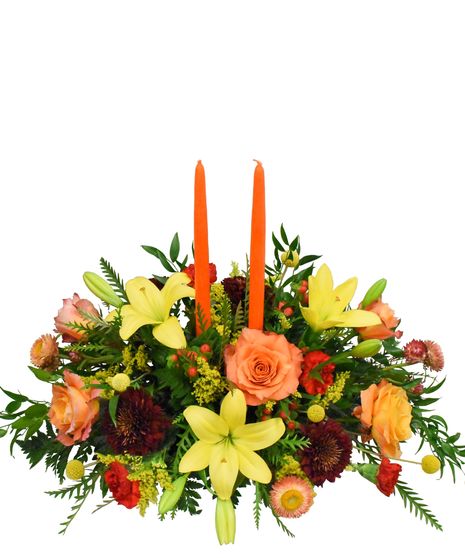 vibrant lilies and delicate strawflowers in rich shades of yellow, orange, and red