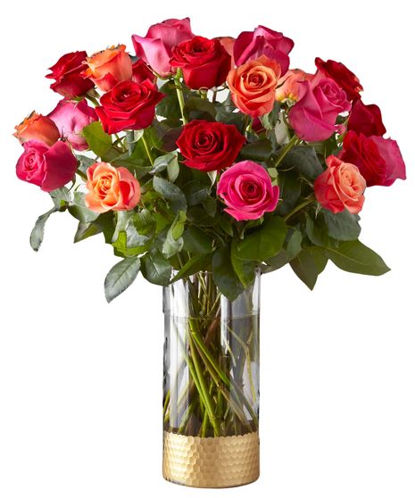 Assorted roses arranged in a vase with baby's breath and greenery.