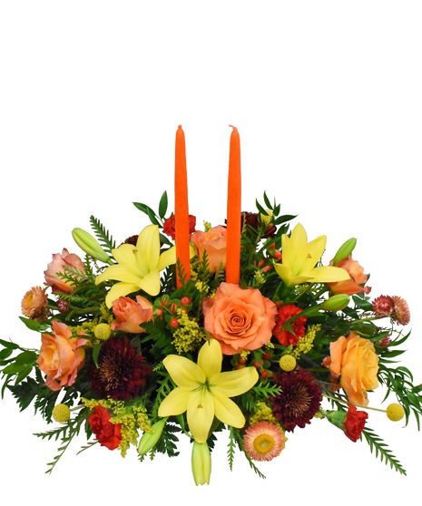 vibrant lilies and delicate strawflowers in rich shades of yellow, orange, and red